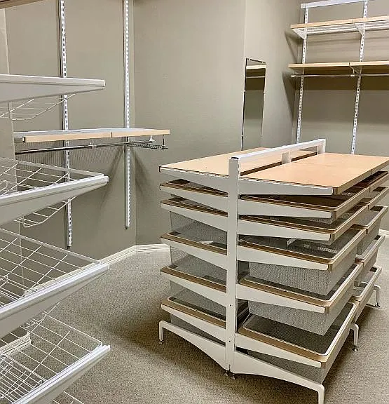 Master's walk in closet, built in ELFA shelving