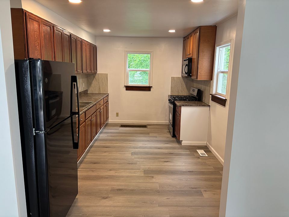 Kitchen with new floors and appliances