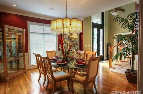 19015 River Ralls Dining Room with Beautiful Chandelier