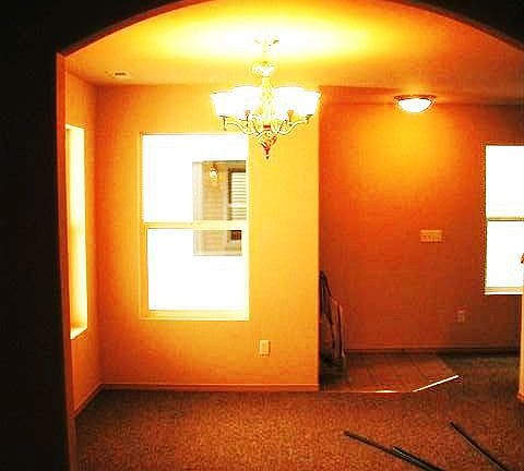 Arched entry into the dining room from the kitchen