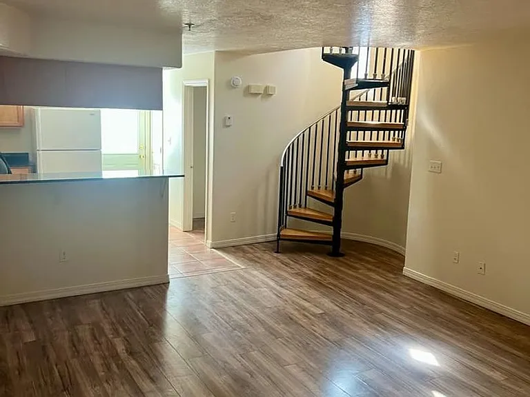 Modern Condo-Style Living Near Nob Hill & UNM $300 Off Move-In Special at The Spirals Apartments — Photo 38