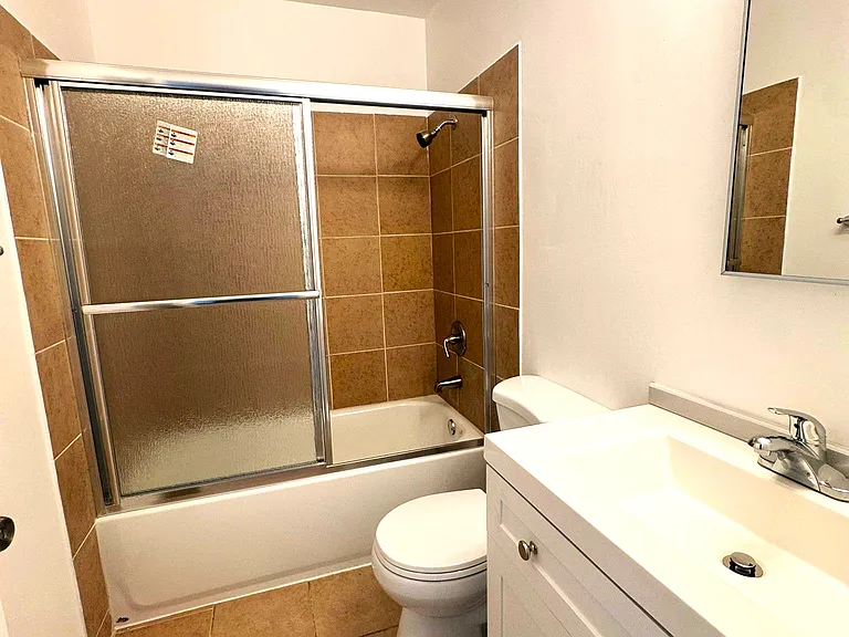 302 Dumont Ave — Photo 10