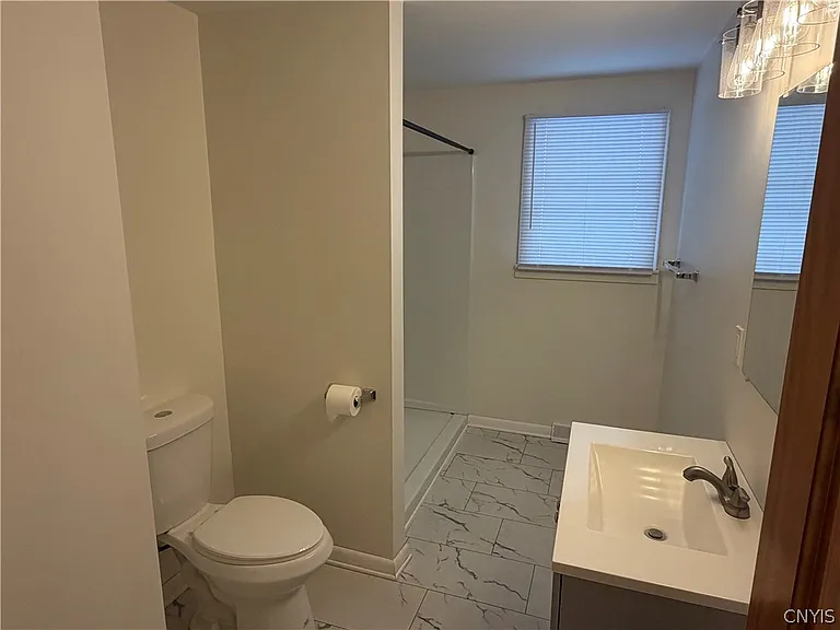 8587 Caughdenoy Rd — Photo 10