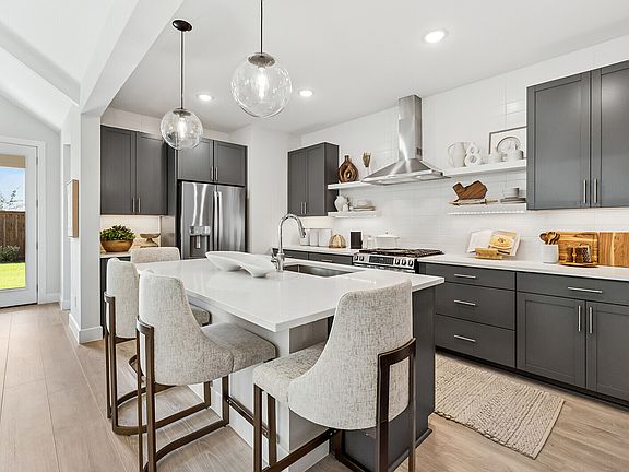 Kitchen featuring floating shelves