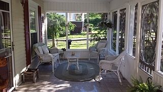 Front Porch
						:
						Screened in front porch with room for a swing