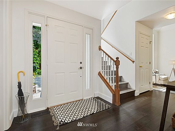 Lovely plank hardwood flooring throughout the main floor and staircase. 