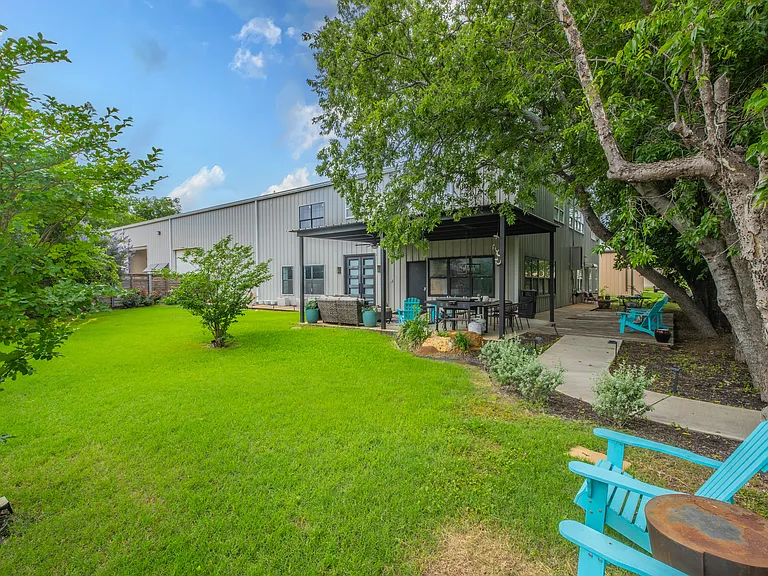 Modern exterior with a clean, open layout and private yard.