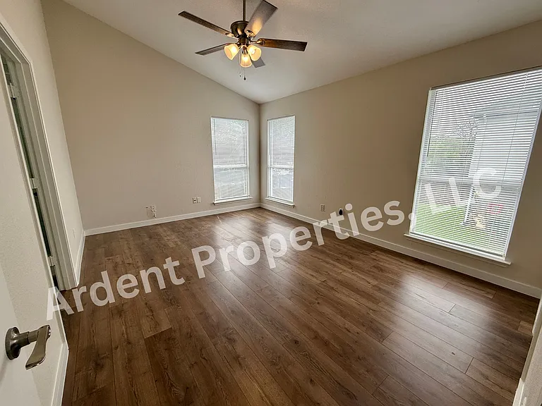 Spacious primary bedroom upstairs with walk-in closet