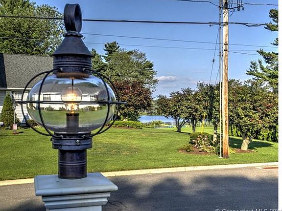 Gorgeous View of Gulf Pond from your front door, Living/ Dining Room and Family Room!