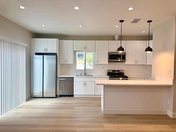 refrigerator, dishwasher, stove, oven, microwave oven included