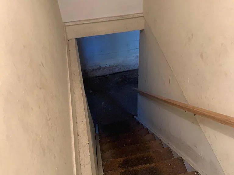 To basement
