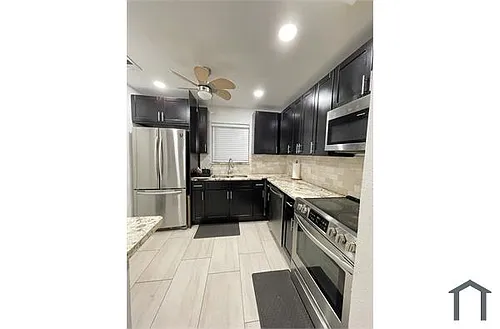 5271 NE 8th Ter Photo 1