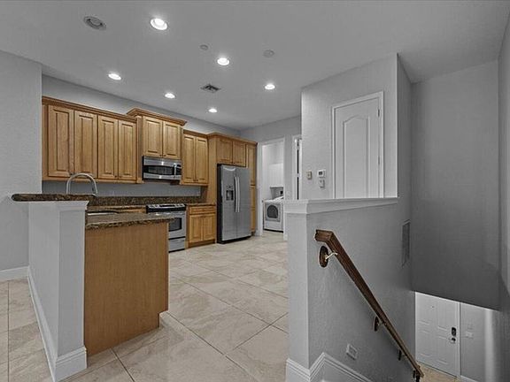 3rd image of 4902 Vine Cliff Way E