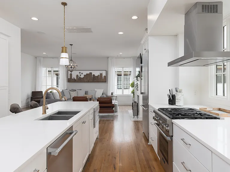 Fully equipped kitchen with stainless steel appliances, seating for 5 at the kitchen island, additional seating at the dining room table and all the dishware / utensils you might need.