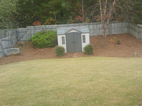 Landscaped, Fully fenced backyard