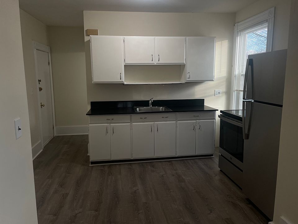 Kitchen with both overhead light and natural light