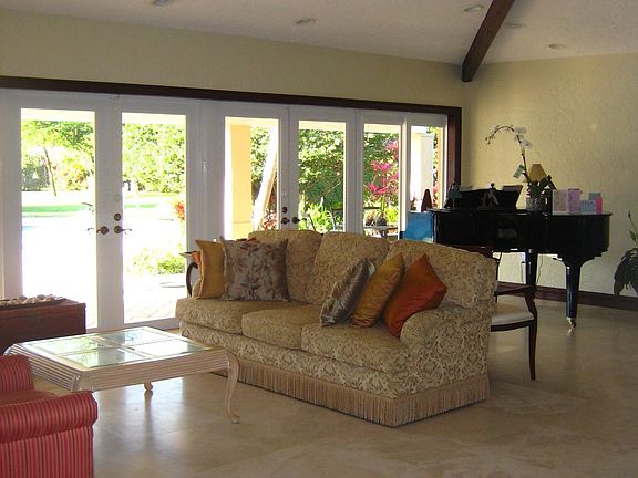 Family living area with pool view