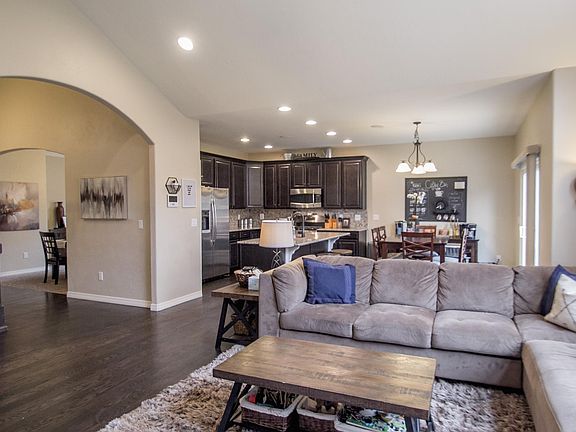 family room looking into kitchen/eating area