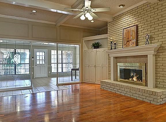 Lovely Leaded Glass Panels divide the Living Room from the Den.