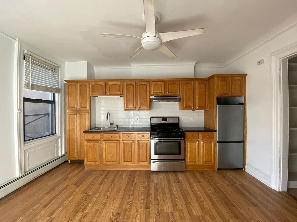 kitchen with tons of cabinets and stainless steel appliances