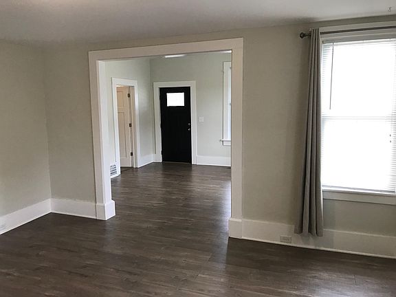 Front door. Entry room and living/dining room.