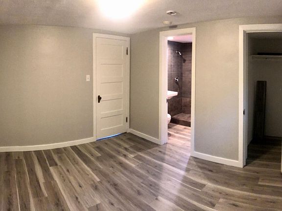 Bedroom with bathroom view and large closet