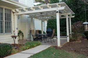 BayckyardArbor with Stone Patio in Backyard