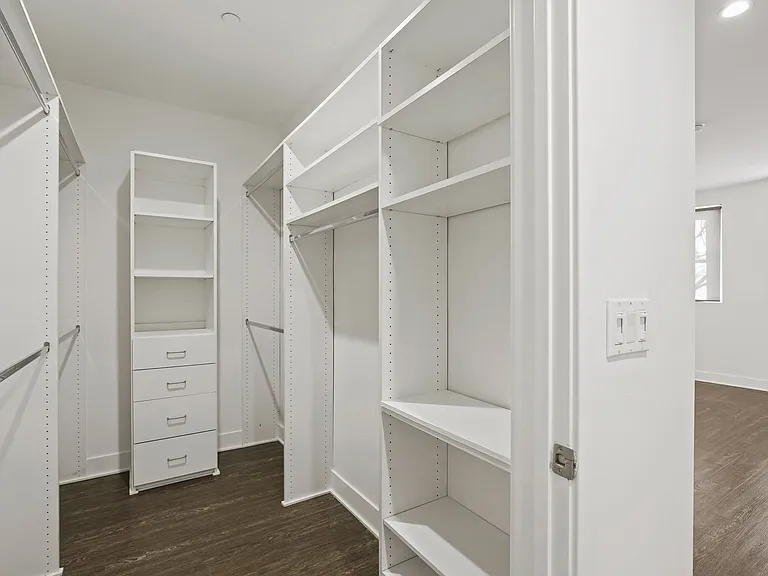 Master Bedroom Walk-In Closet with Built-In Organizers