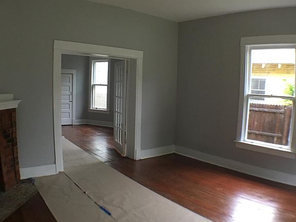 Living room from doorway looking west toward dining room (northwest).