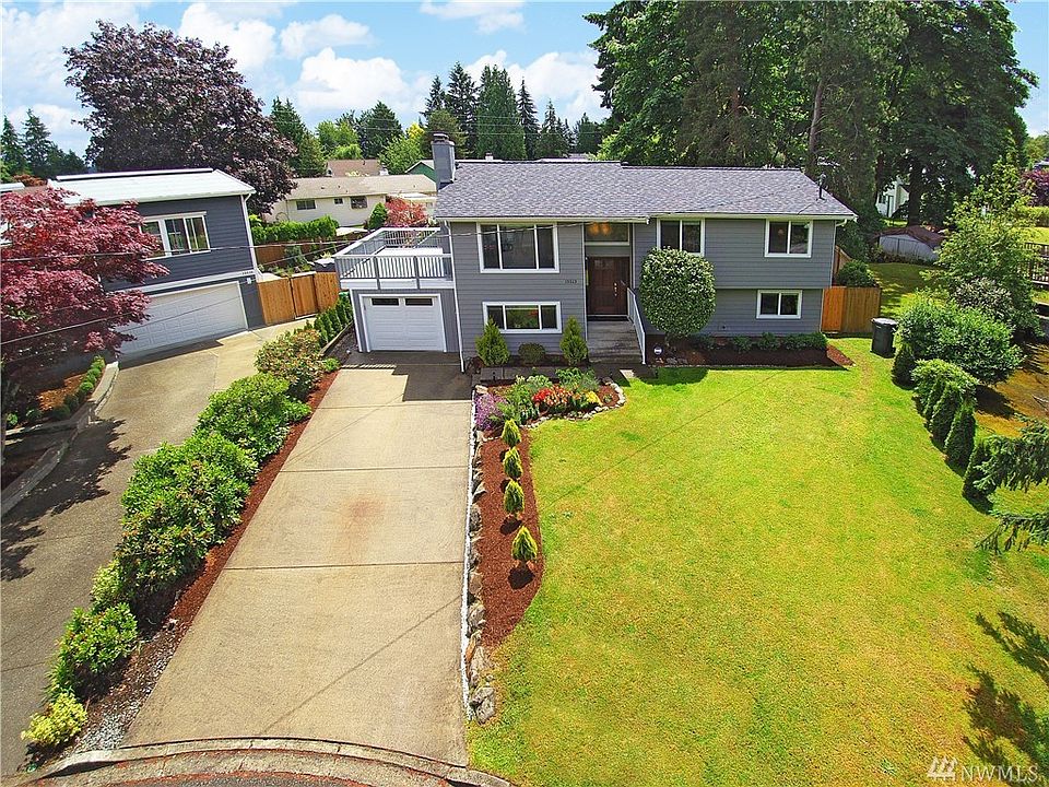 You will love this completely remodeled split level home on a huge, flat and manicured yard.