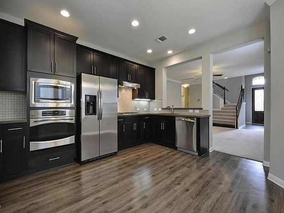 Eat-in kitchen, entry and stairwell