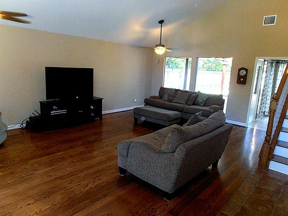 Another view of the living area.  Huge windows with a view of the back yard.