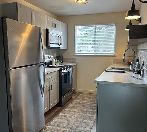 Refrigerator, stove, micro and dishwasher.