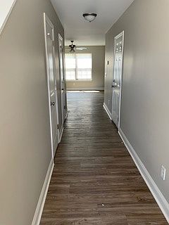 Entrance Hallway with access to garage 1/2 bathroom & at the back living & dining rooms and kitchen