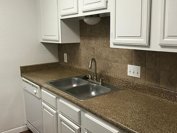 Upgraded kitchen floors, fixtures and faucets