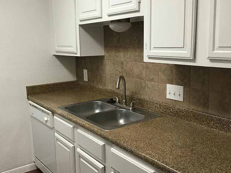 Upgraded kitchen floors, fixtures and faucets