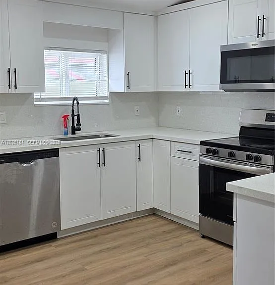 3651 NW 8th Ct — Photo 7