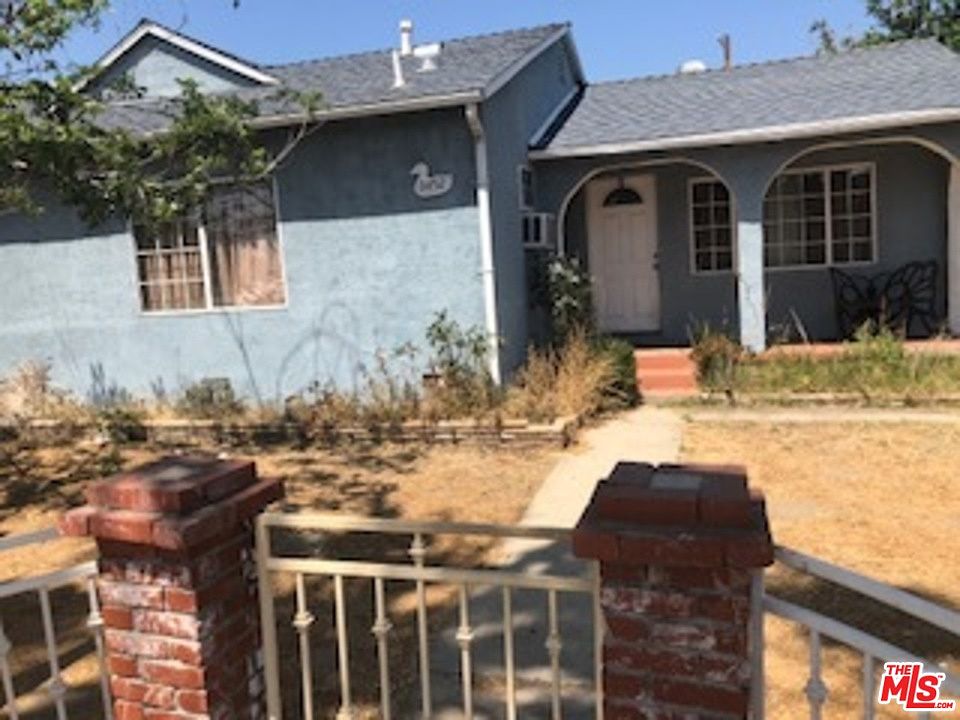 2nd image of 9452 Woodman Ave