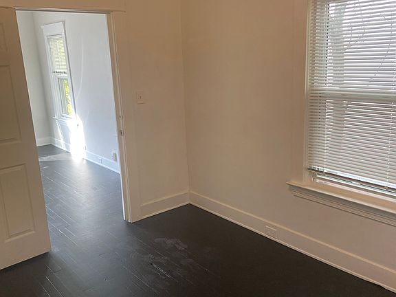 Back bedroom and door to living room