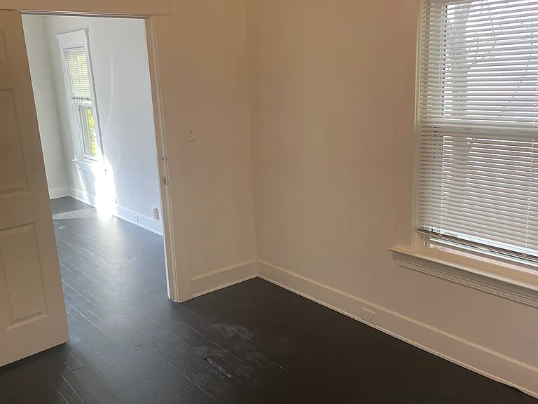 Back bedroom and door to living room