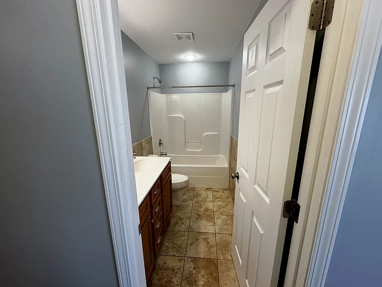 Entry to the bathroom ready for use.
