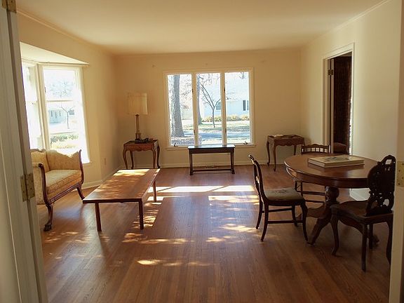Formal living area with natural sunlight