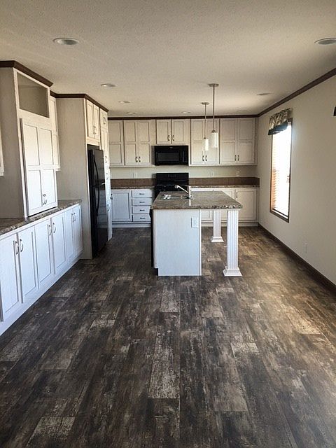 Large whitewashed kitchen