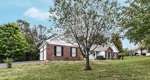 Delightful curb appeal with heated 3 car side entry garage and new roof!