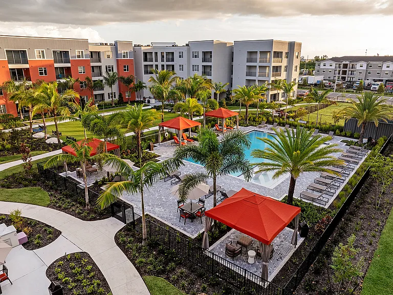 Experience resort-style living at this luxurious apartment complex, equipped with vibrant amenities and beautiful landscaping.