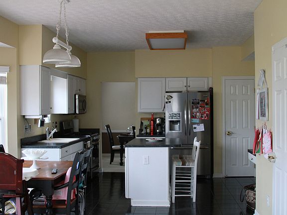 Kitchen leads to dining room