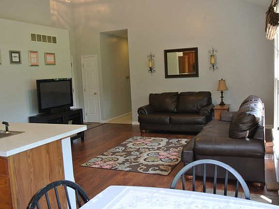 Looking back toward front entry and hallway leading to bedrooms.