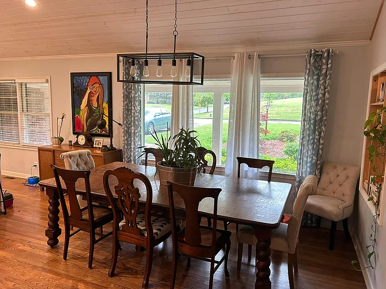 Dining room with main entrance behind wall