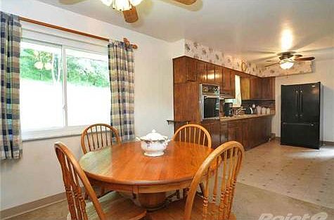 just off the kitchen