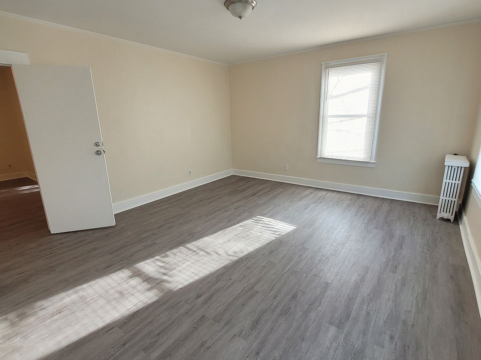 Master bedroom has three windows and walk-in closet.